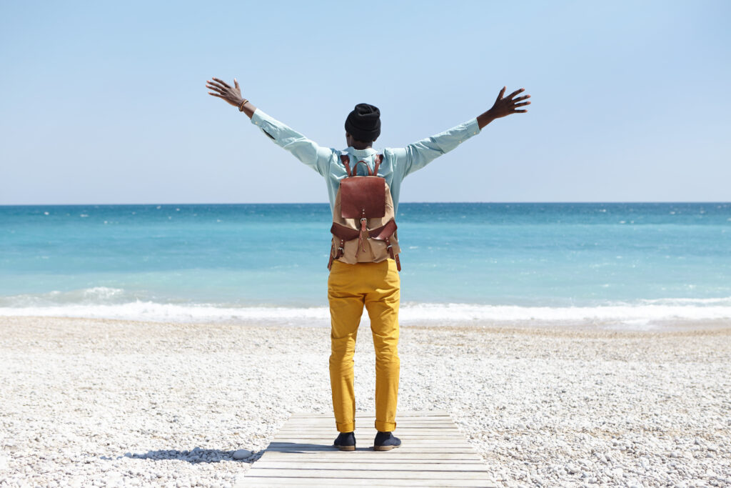 Person visualizing financial goals through meditation and journaling.